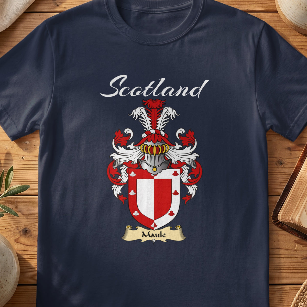 Navy Maule family shield T-shirt featuring a red-and-white shield with a contrasting border