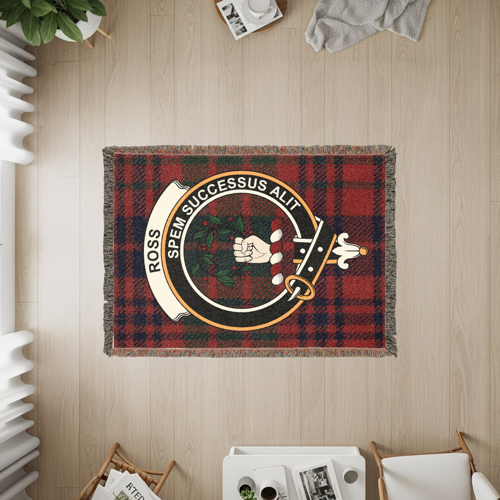 Tapestry with red plaid pattern and the Ross clan crest with motto.