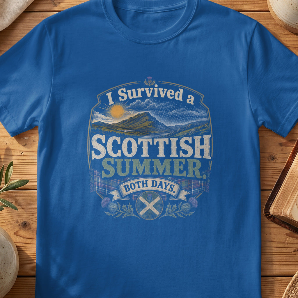 Blue t-shirt with "I survived a Scottish Summer. Both Days." text and Scottish imagery.