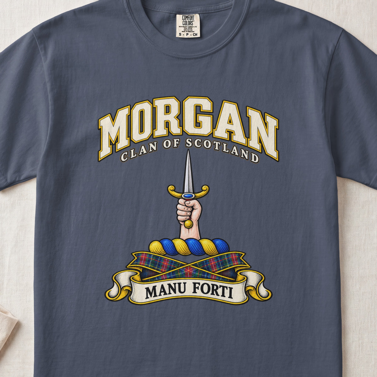 Morgan Scottish clan T-shirt in Midnight, front view with a hand holding an upright dagger and motto banner.