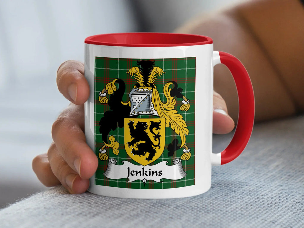 Jenkins Welsh tartan accent mug with red handle and lion shield crest held in hand