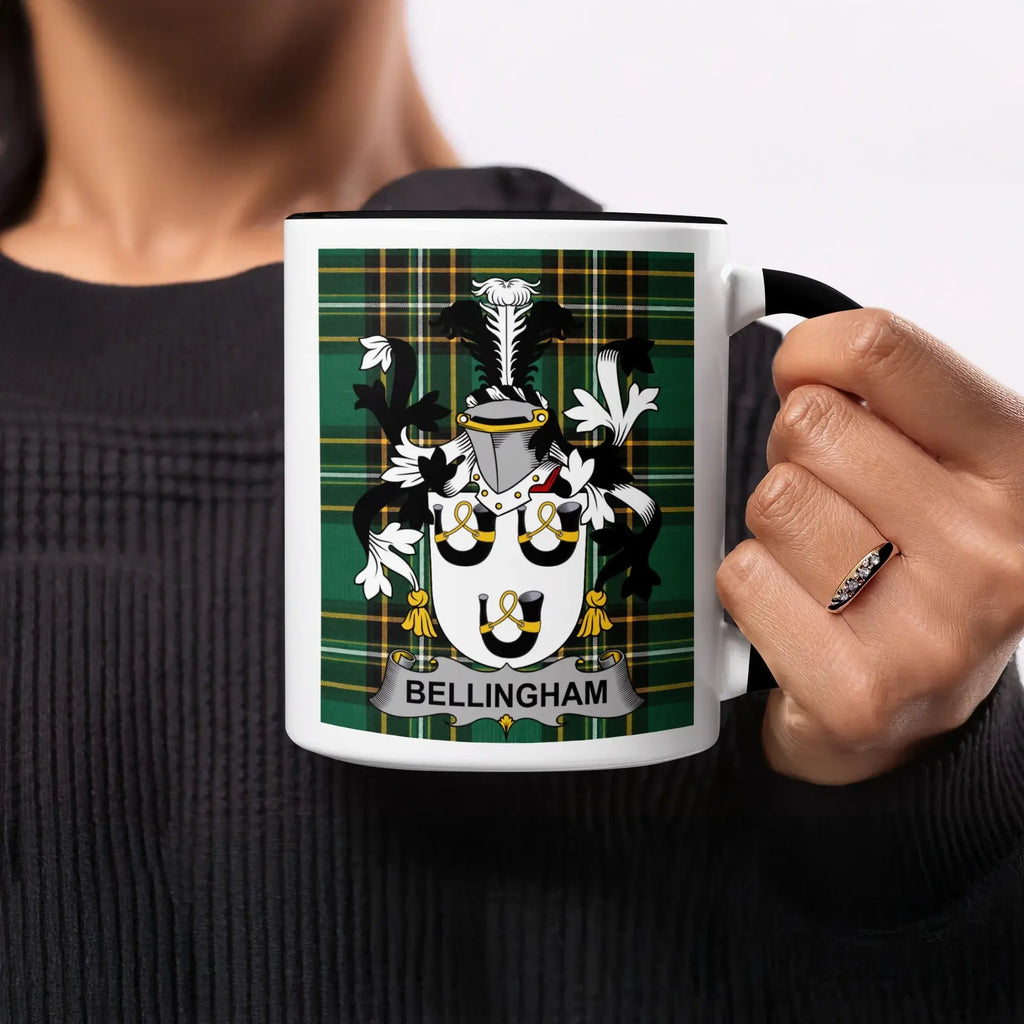 Mug with the Bellingham family crest on a green tartan background.