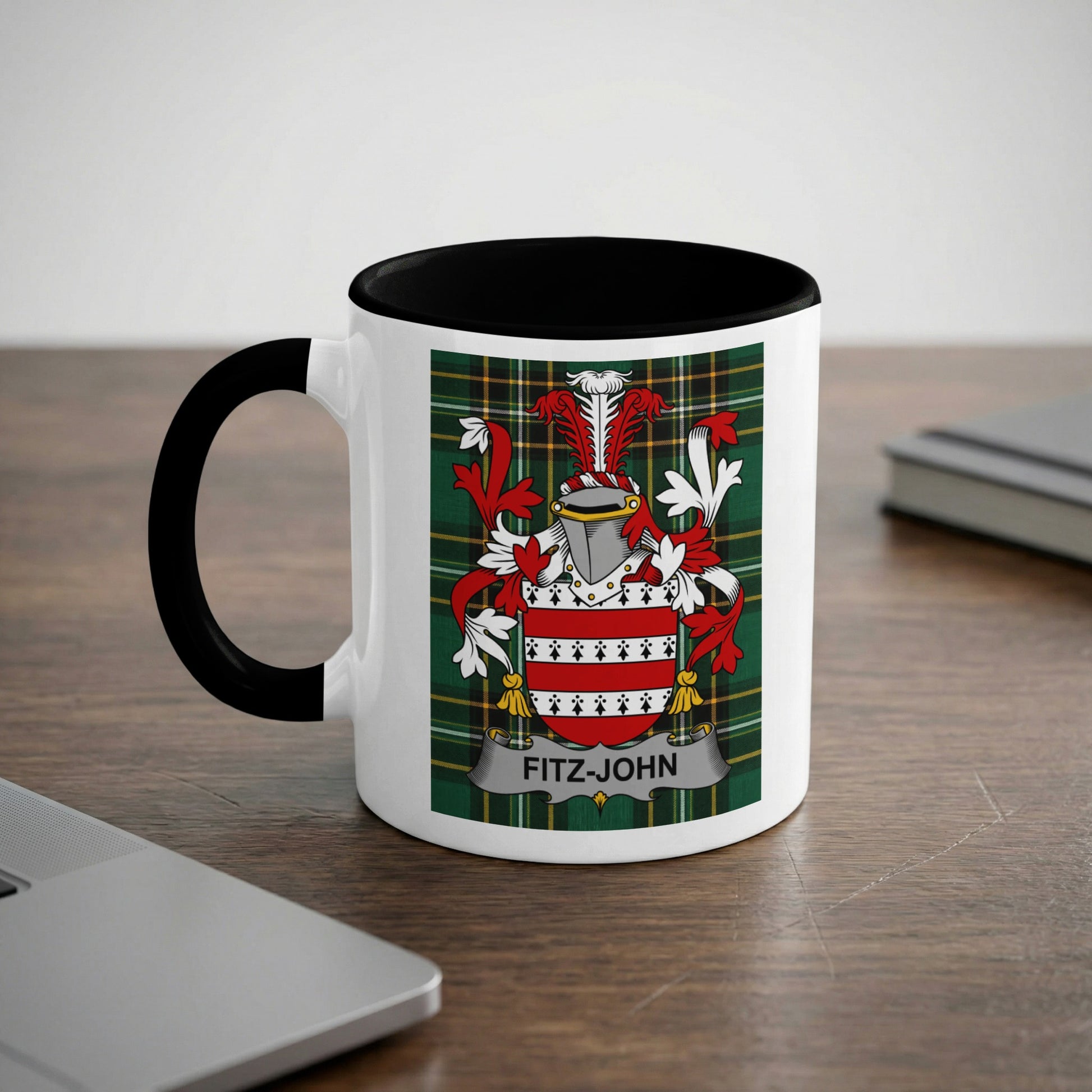 White mug with black rim displaying a Scottish tartan and a family crest with "FITZ-JOHN" text.