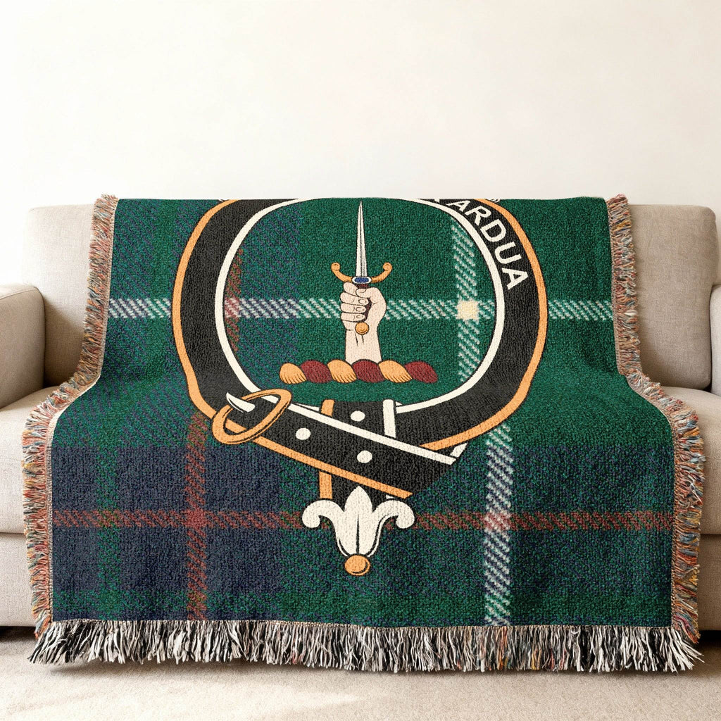 MacIntyre clan crest tartan woven blanket — fringe edge visible, 100% cotton