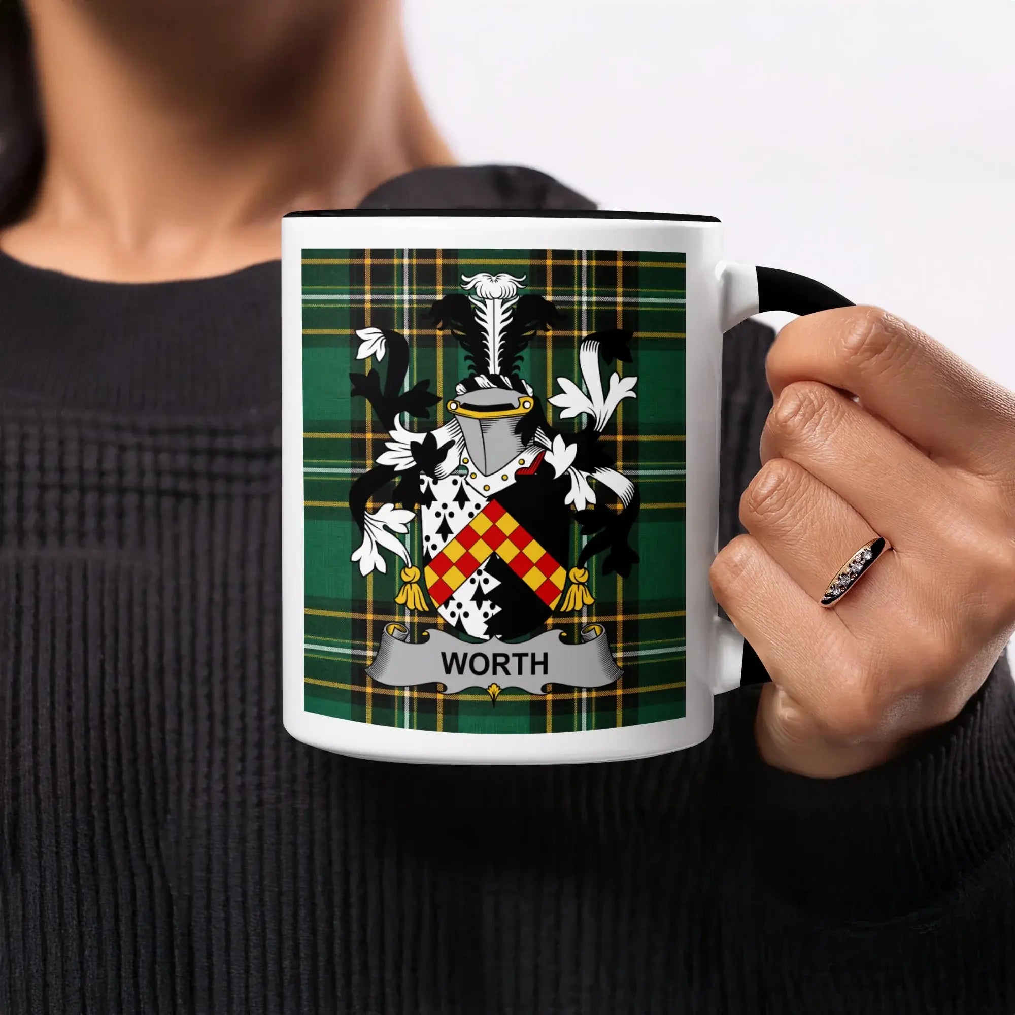 Mug with the Worth family crest on a tartan background.