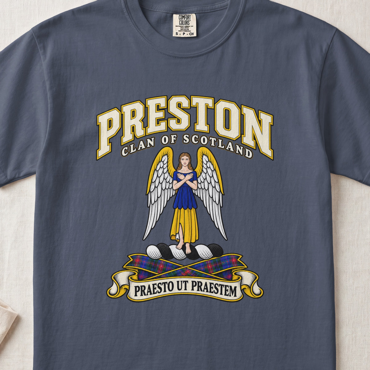 Preston Scottish clan T-shirt in Midnight, front view with a winged figure in blue and gold clothing and motto banner.