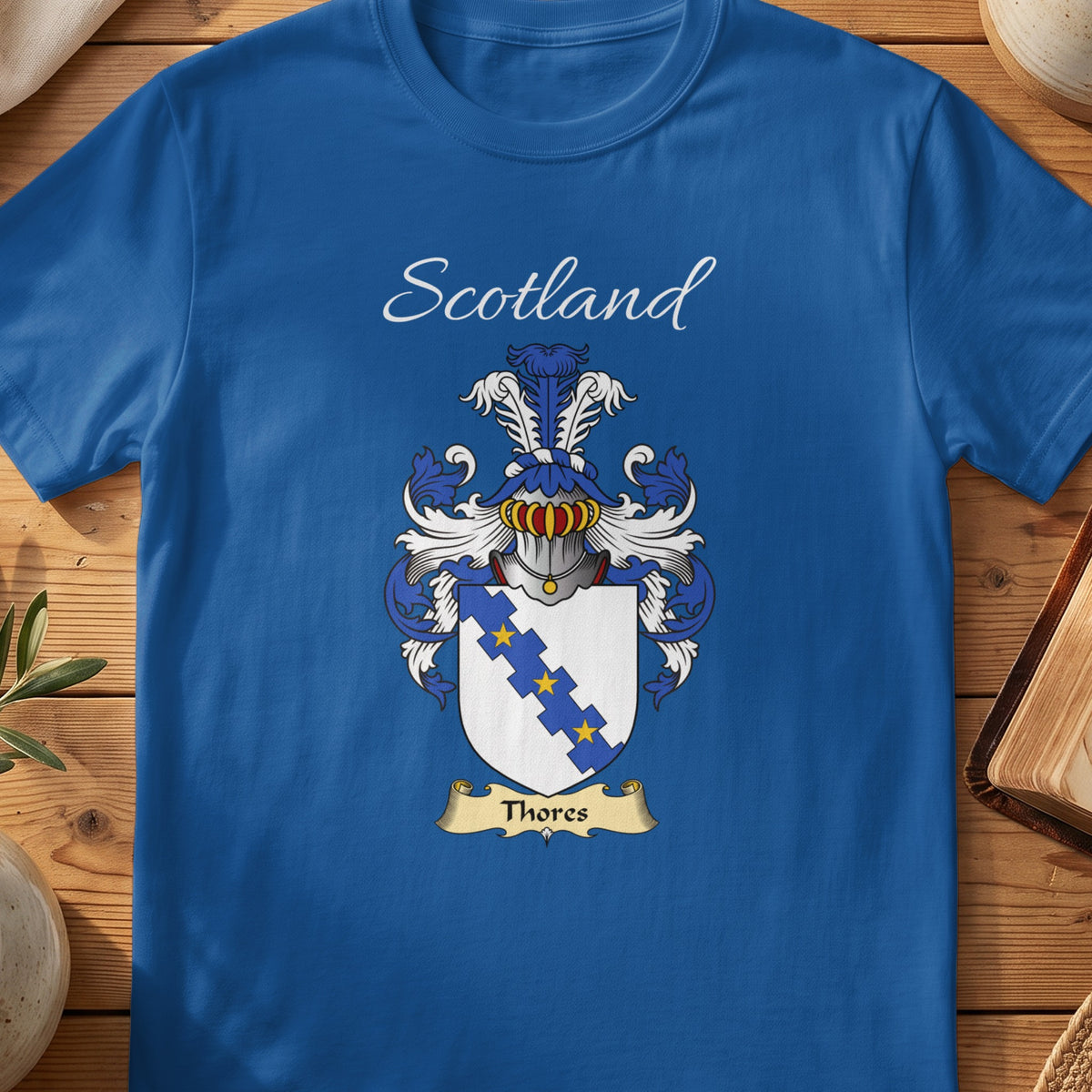 Royal blue Thores unisex heritage T-shirt with the family shield and surname design.
