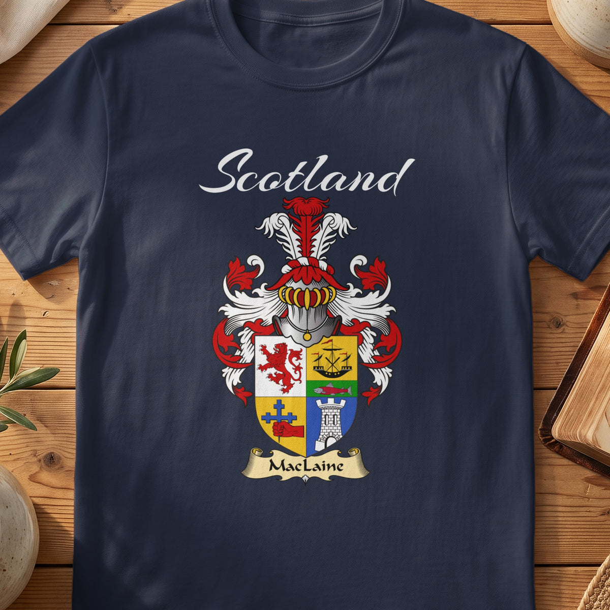 Navy MacLaine family shield T-shirt featuring a quartered shield with an anchor and tower