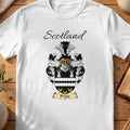 White Bragg Scottish family shield T-shirt featuring white towers and gold crescents on black