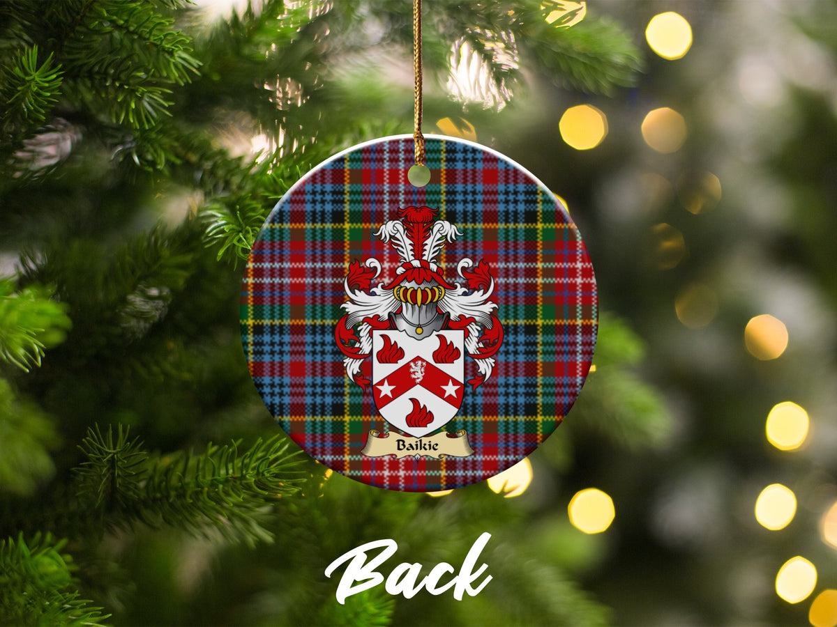 Double-sided Baikie ceramic ornament with family shield and Caledonia tartan background