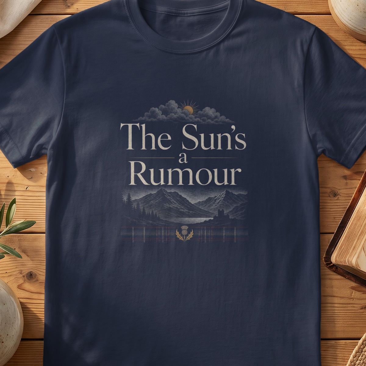 Navy Gildan 64000 unisex T-shirt flatlay with The Sun's a Rumour Scottish graphic design