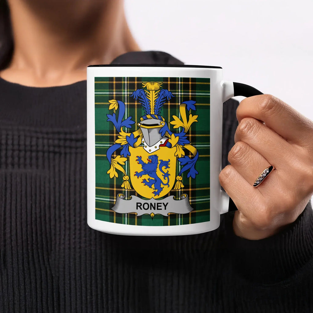 Mug with Roney family crest on green tartan background.