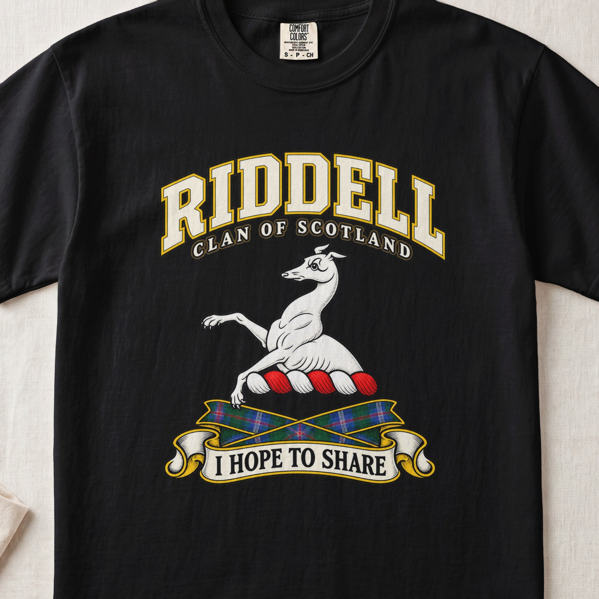 Riddell Scottish clan T-shirt in Black, front view with a white greyhound with raised forelegs and motto banner.