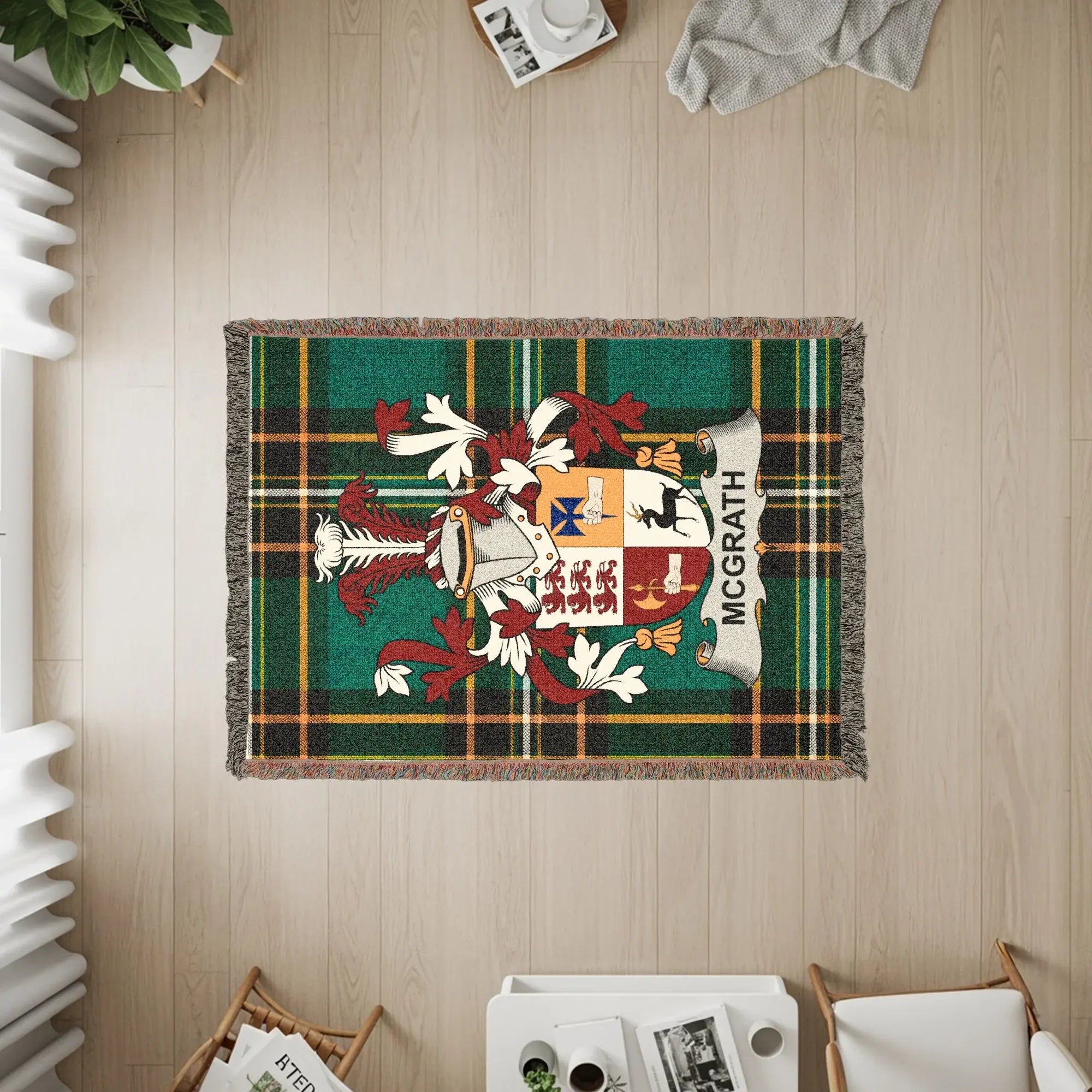 McGrath tartan crest blanket draped over a wooden floor.