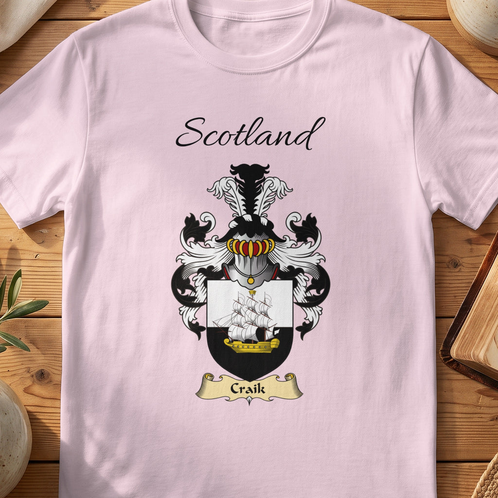 Light Pink Craik Scottish family shield T-shirt featuring a sailing ship on a black-and-white shield