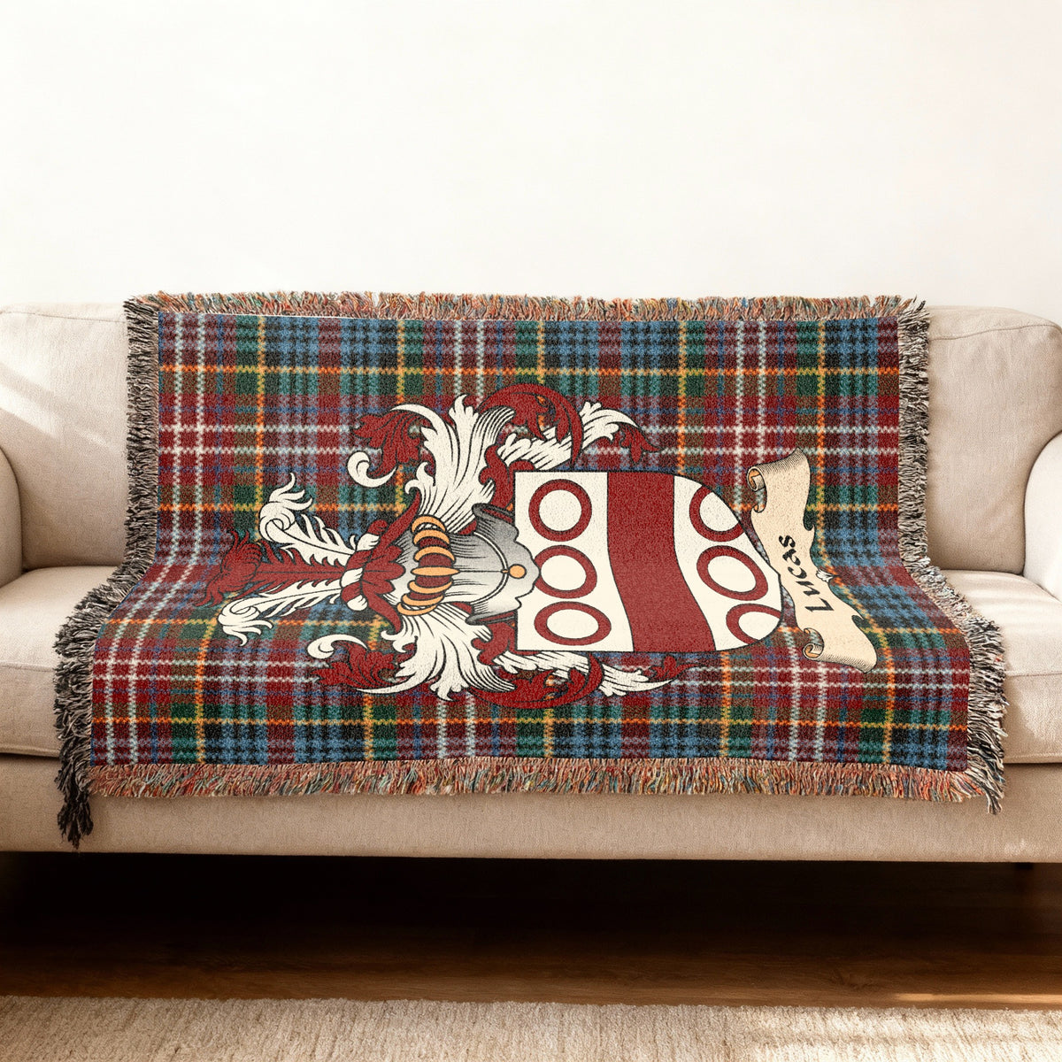 Lucas Scottish woven blanket with family shield and Caledonia tartan background
