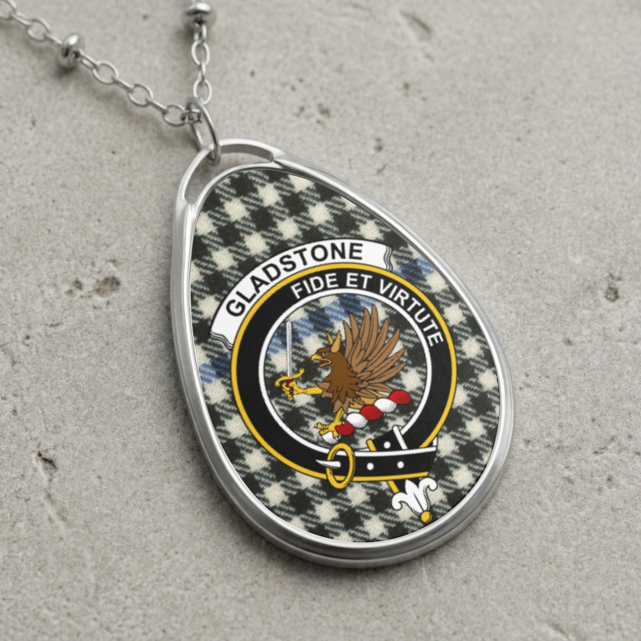 Gladstone clan Scottish tartan necklace with clan crest and Fide et Virtute motto on tartan background