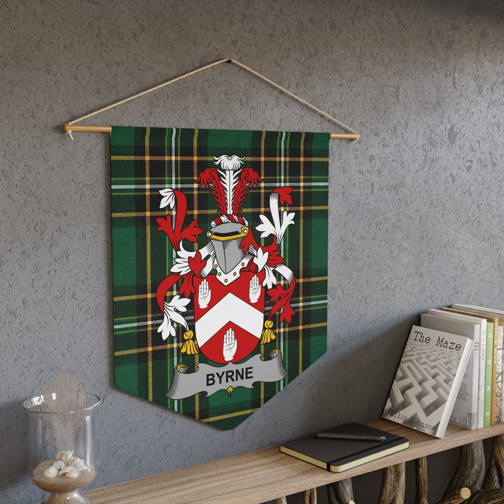 Byrne family crest on green plaid banner hanging on a textured wall.