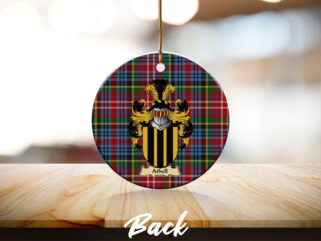 Round Athell Scottish clan ornament with family crest on a Caledonia tartan background