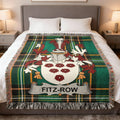 Tartan blanket with Fitz-Row crest featuring shields and roses.