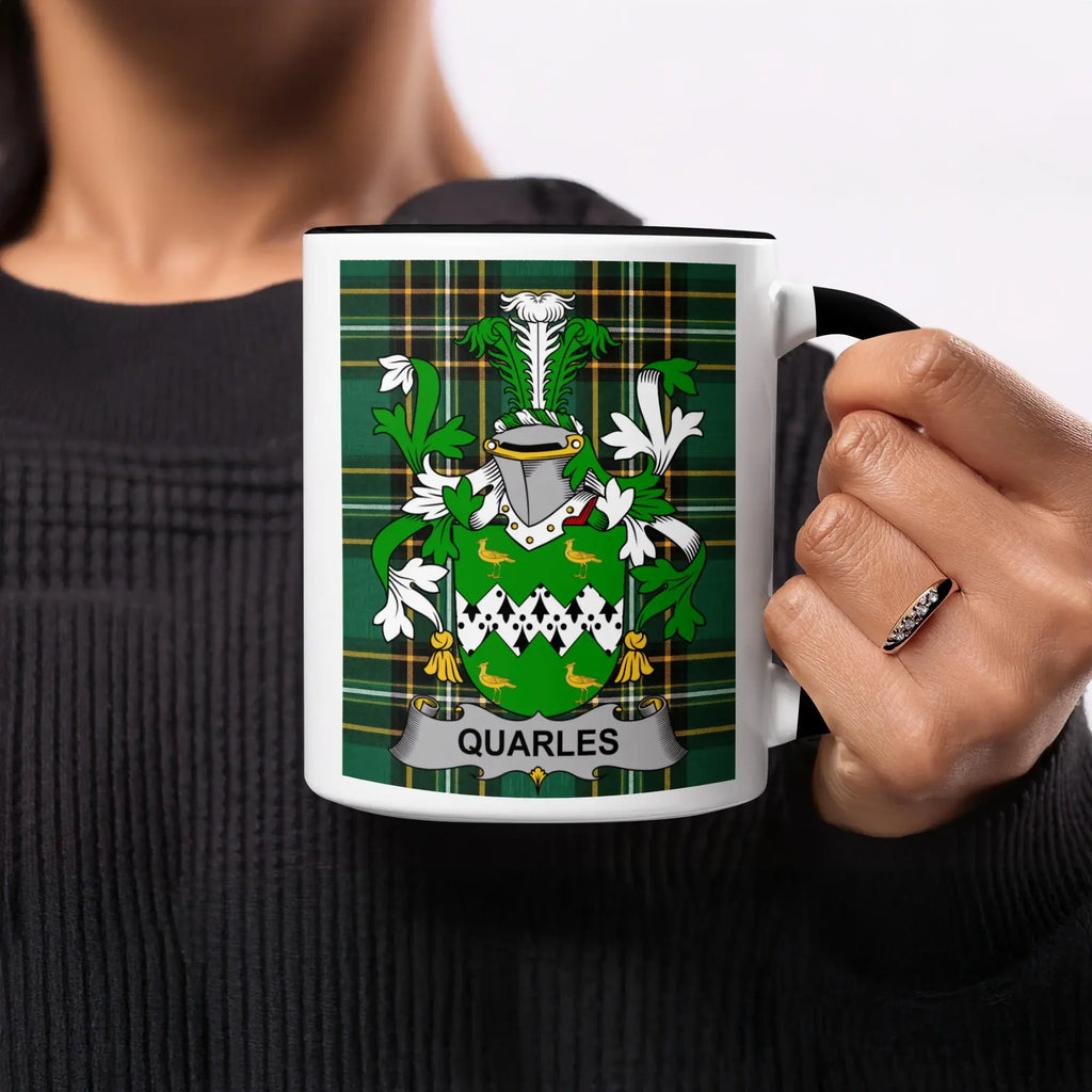 Quarles family crest on a white mug with a black handle.