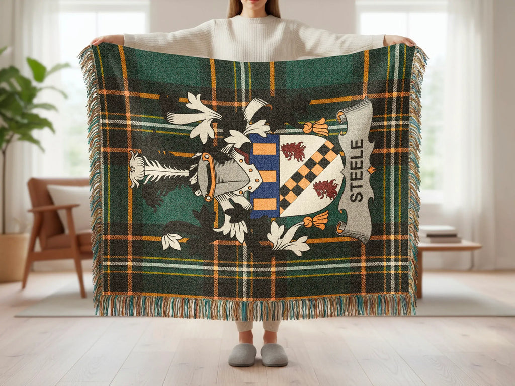 Tartan blanket with family crest featuring the name STEELE.