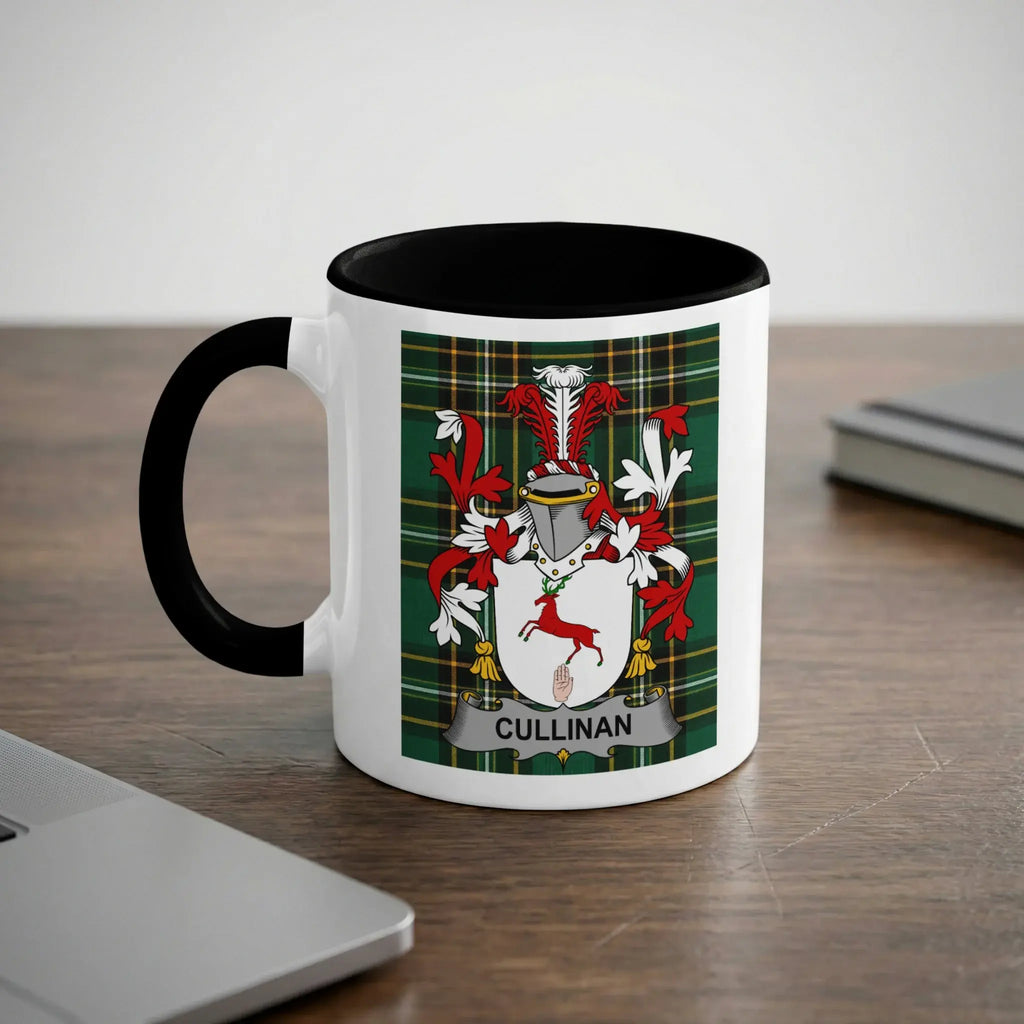 White mug with black handle and rim, displaying the Cullinan family crest.