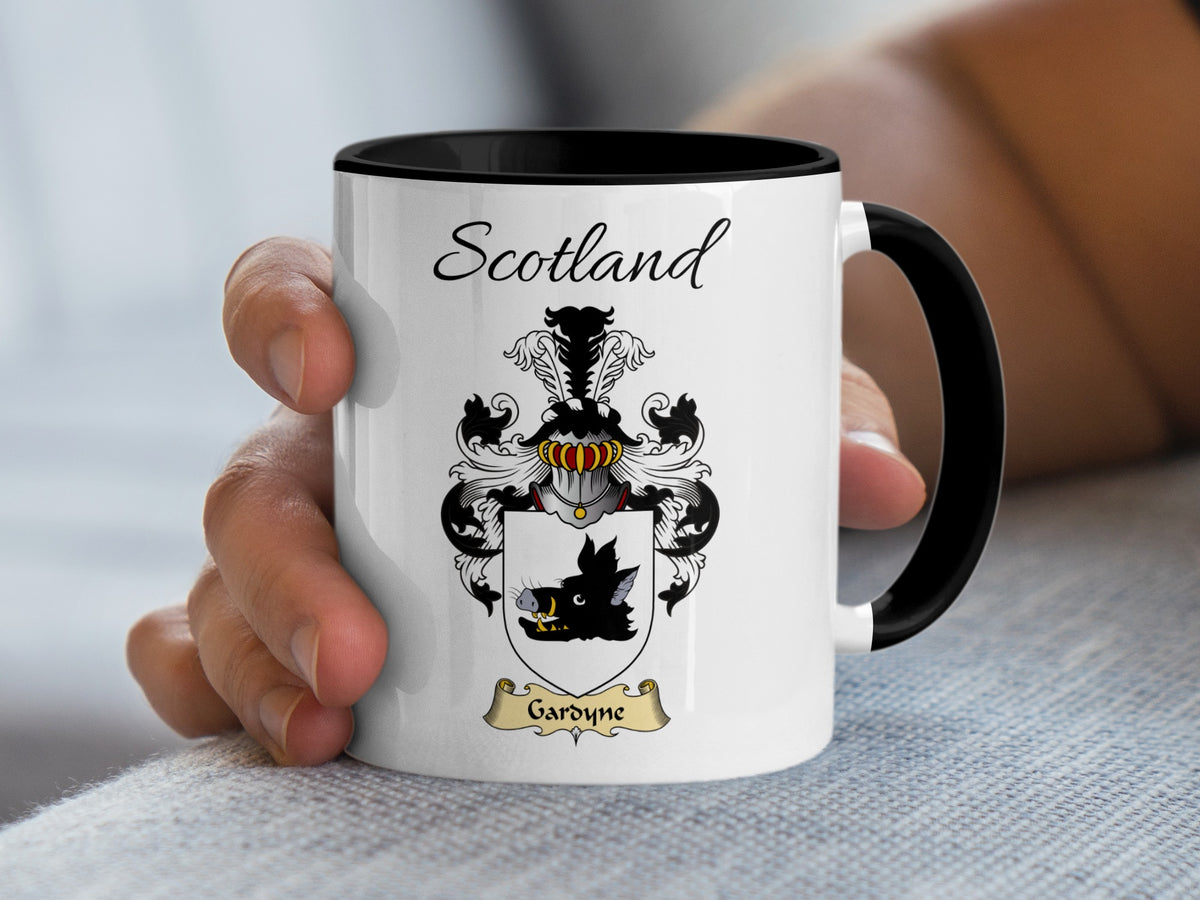 Gardyne family shield and Scotland lettering on a white accent mug with black handle and interior