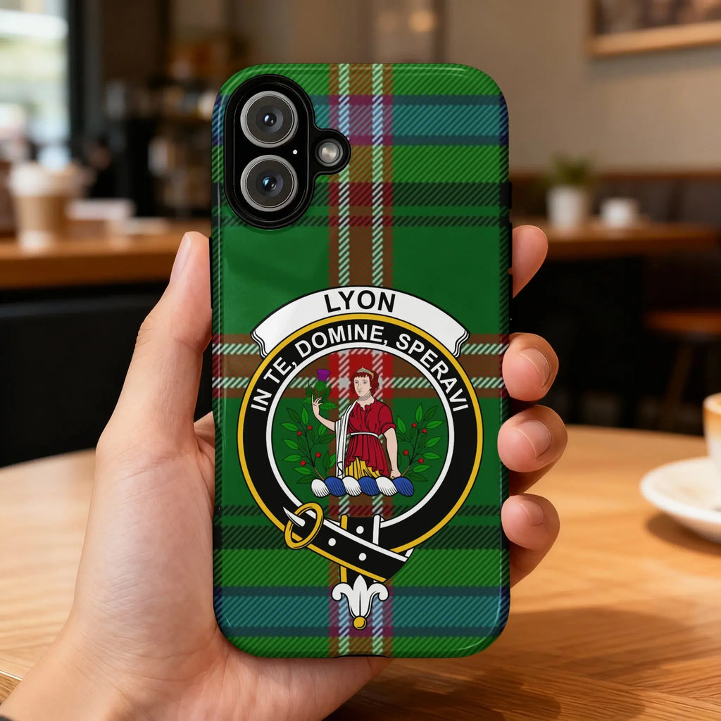 Clan Lyon crest phone case — iPhone fit shown, edge-to-edge tartan print with precise port cutouts