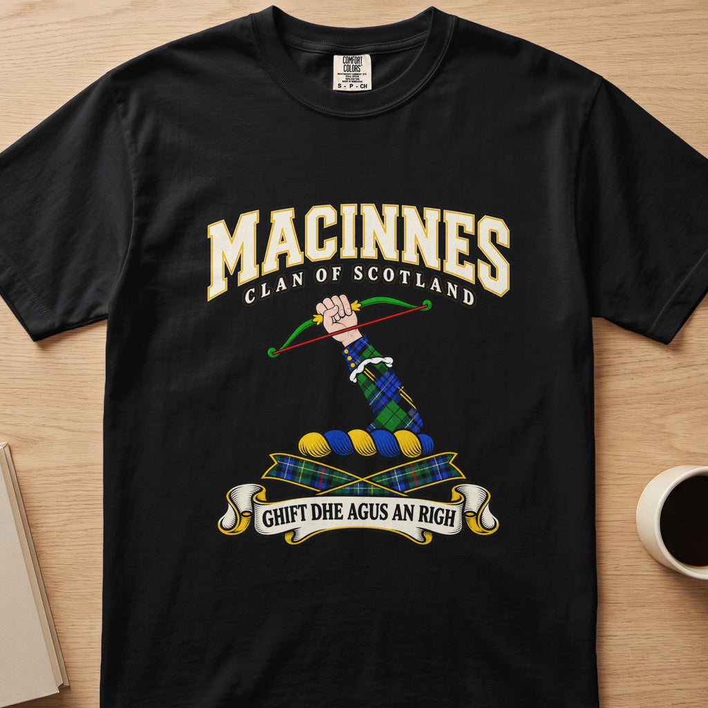 MacInnes clan crest with a bow and tartan ribbons on a black Comfort Colors T-shirt, front view