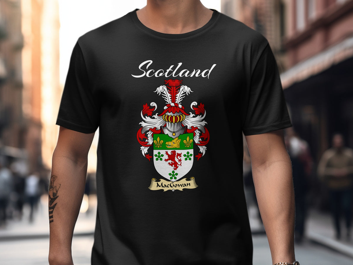 Model wearing a black MacGowan T-shirt featuring a green-and-white shield with a red lion and clover motifs