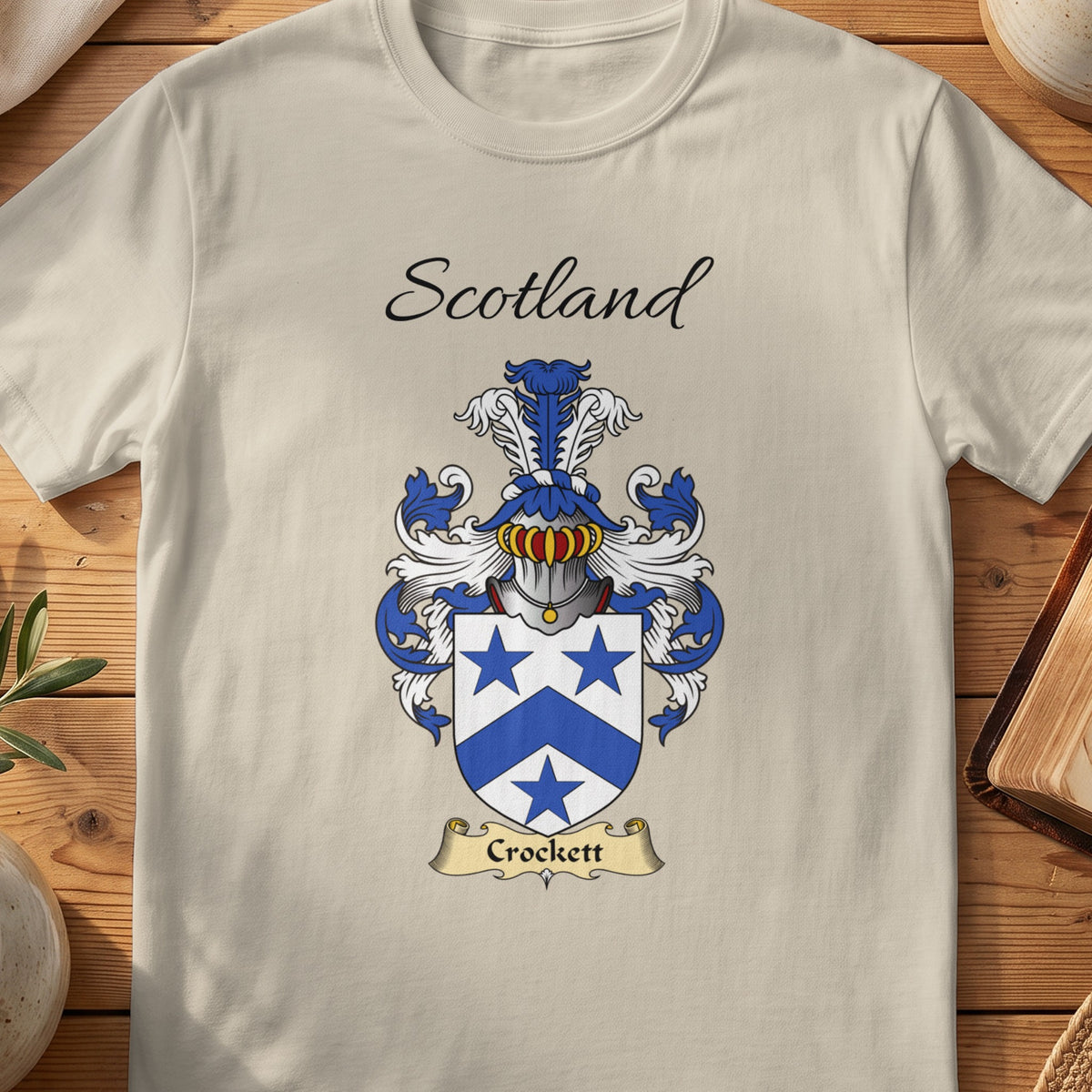 Sand Crockett Scottish family shield T-shirt featuring a blue chevron between blue stars