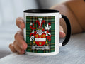 Mug with Warwick family crest on tartan background.