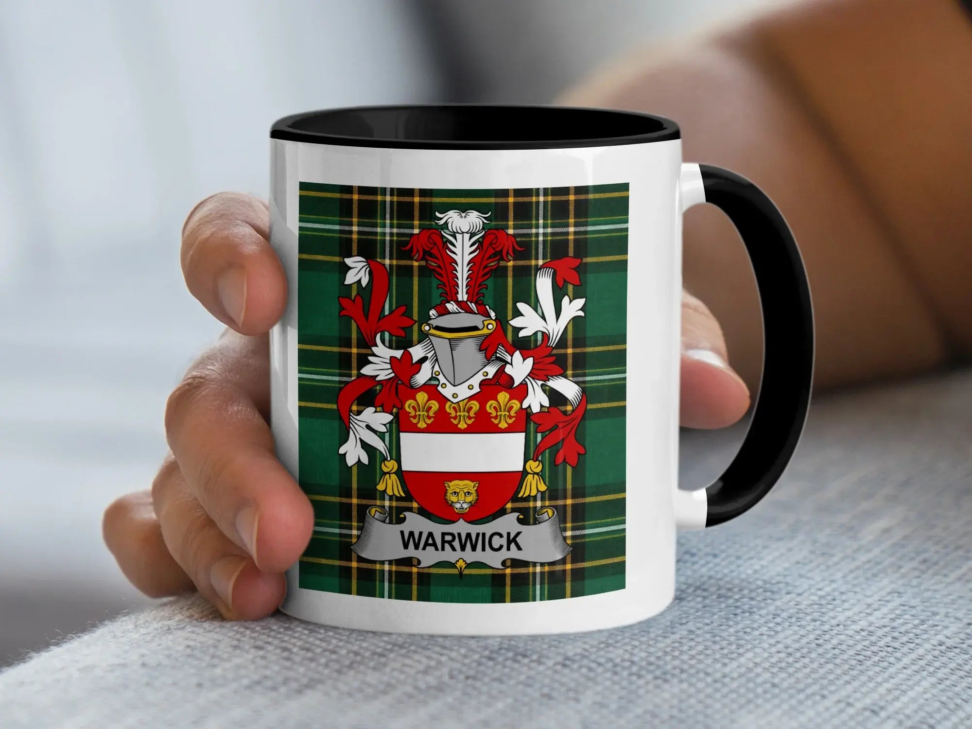 Mug with Warwick family crest on tartan background.