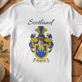 White Dingwall Scottish family shield T-shirt featuring a gold border and gold motifs on blue