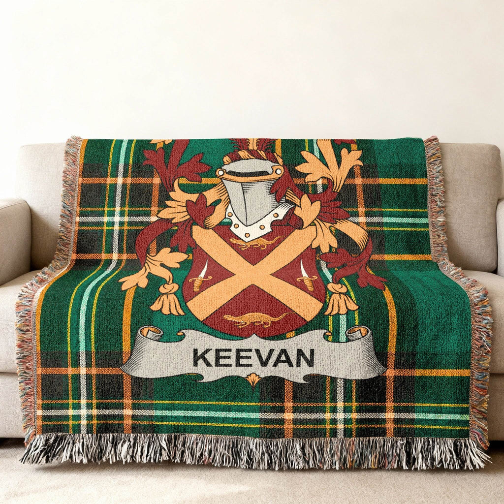 Keevan family crest woven throw blanket with green plaid pattern.