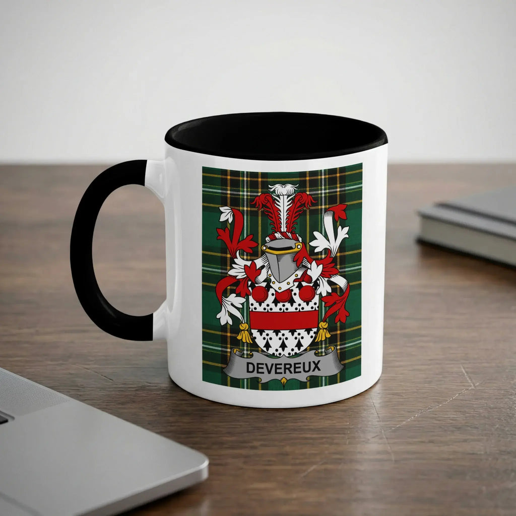 White mug with Devereux family crest on green tartan background.