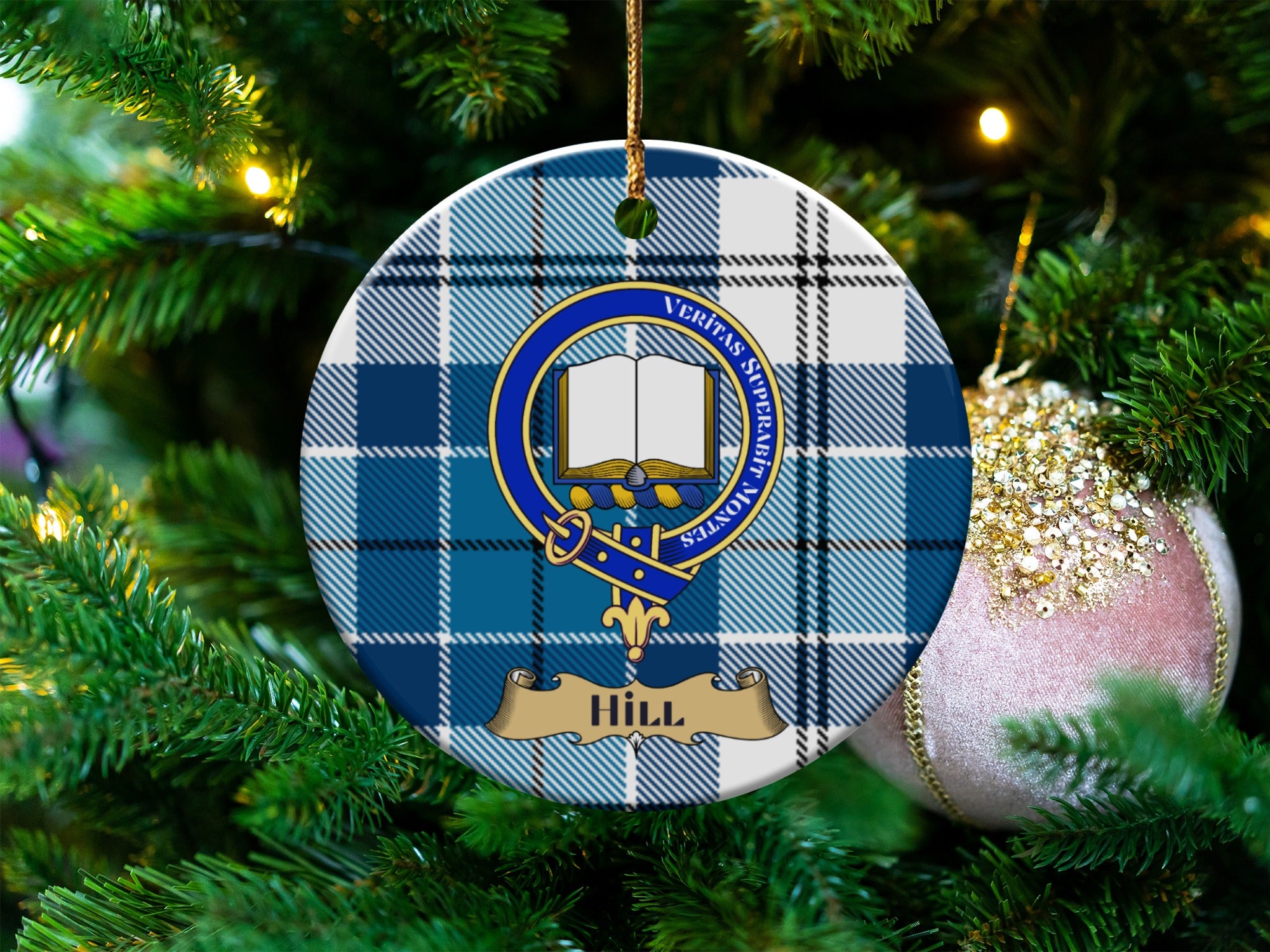 Hill clan crest tartan ceramic ornament hanging on a Christmas tree