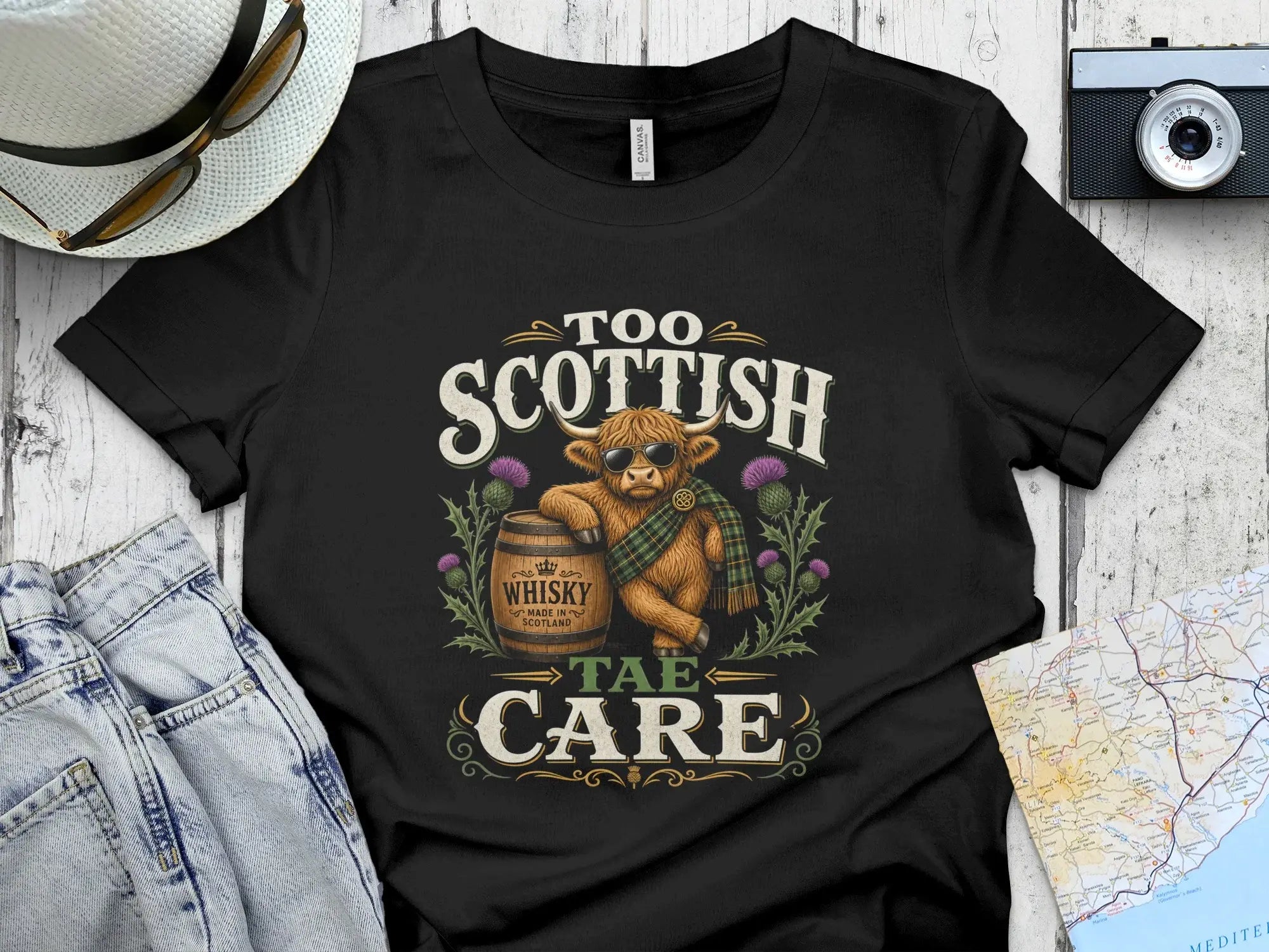 Scottish whisky barrel with tartan, thistles, and "Too Scottish Tae Care" text.