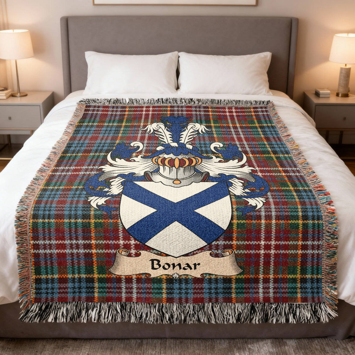 Bonar family crest emblem on a Caledonia tartan woven blanket