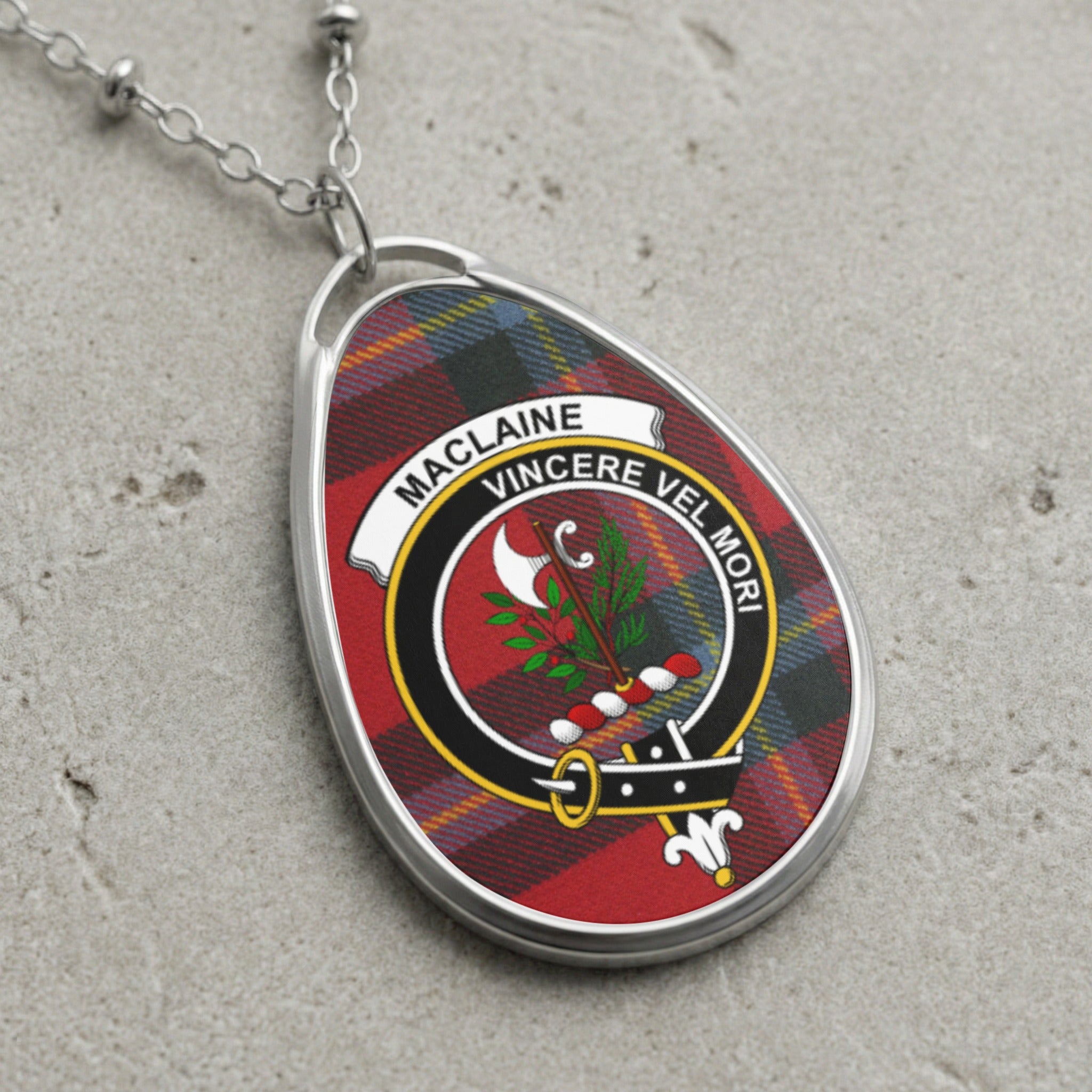 Maclaine tartan oval pendant necklace with clan crest and Latin motto.