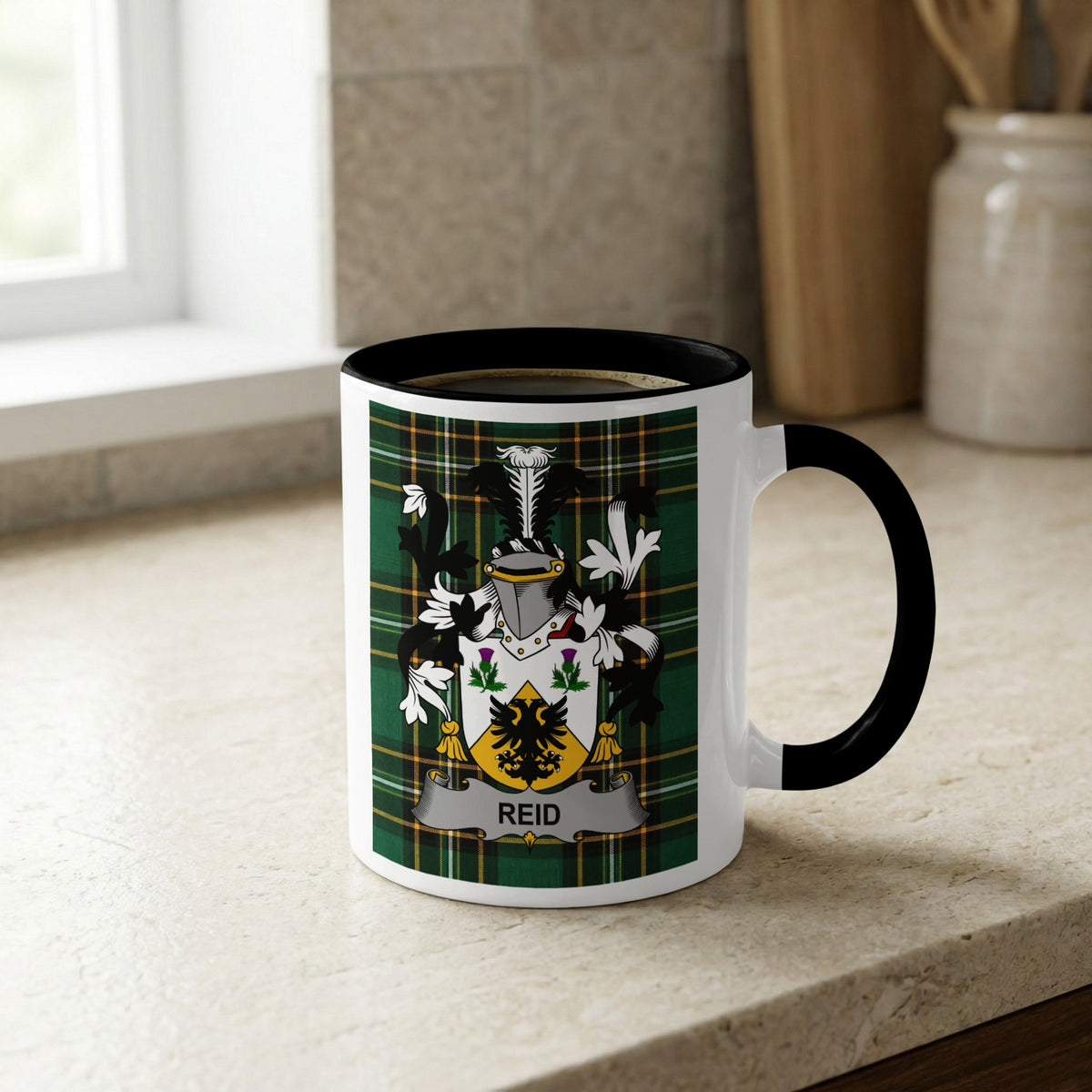 Reid Irish heritage ceramic mug showing tartan and surname emblem