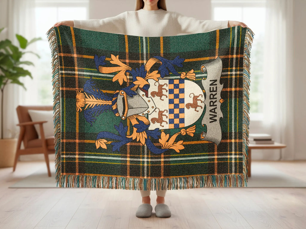 Tartan throw with crest featuring armor, shield, and "WARREN" text.