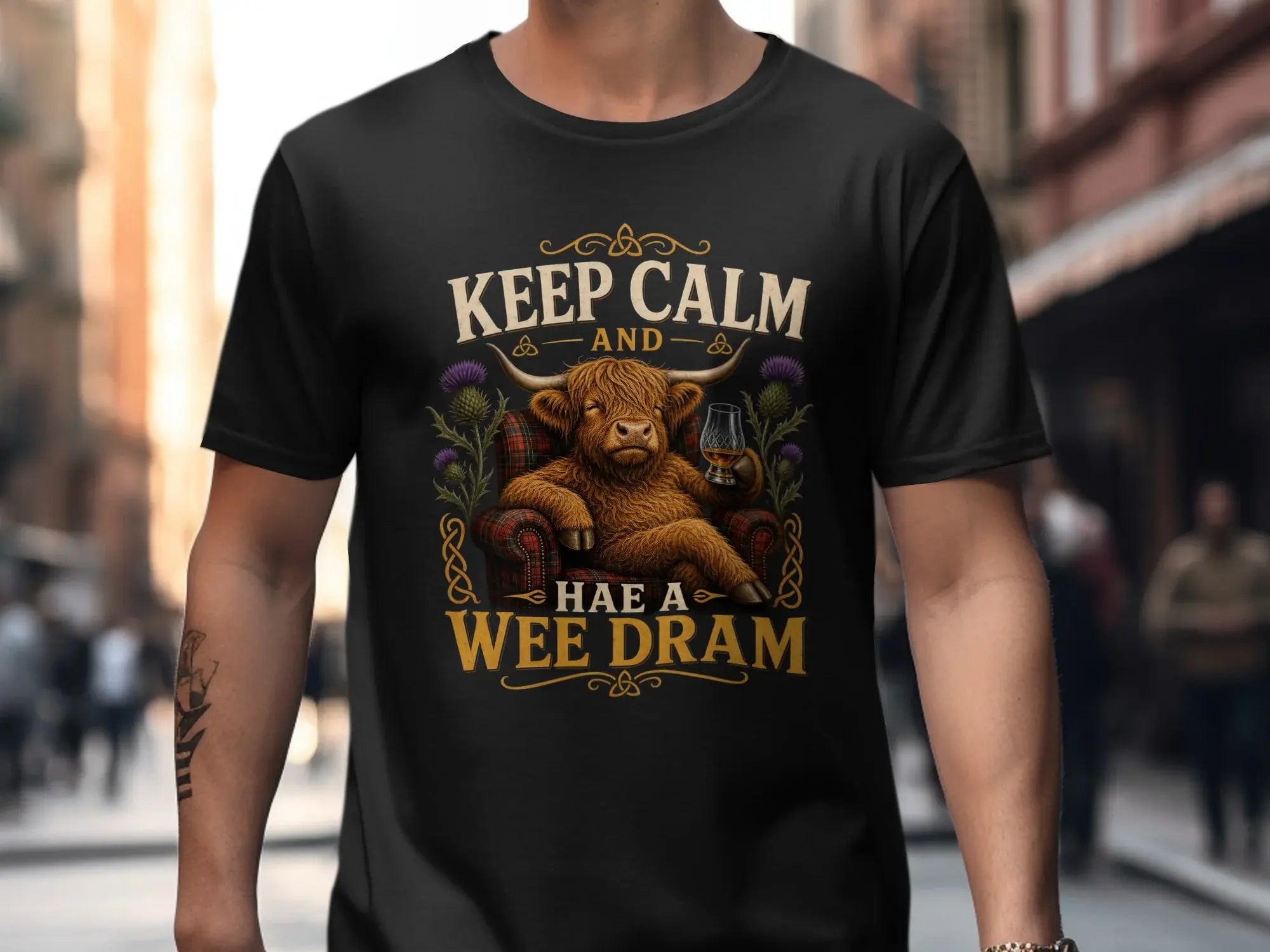 Highland cow sits in armchair, holding a drink, text "Keep Calm and Hae a Wee Dram".