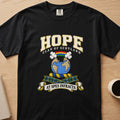 Hope clan crest with globe and rainbow on a black Comfort Colors T-shirt, front view