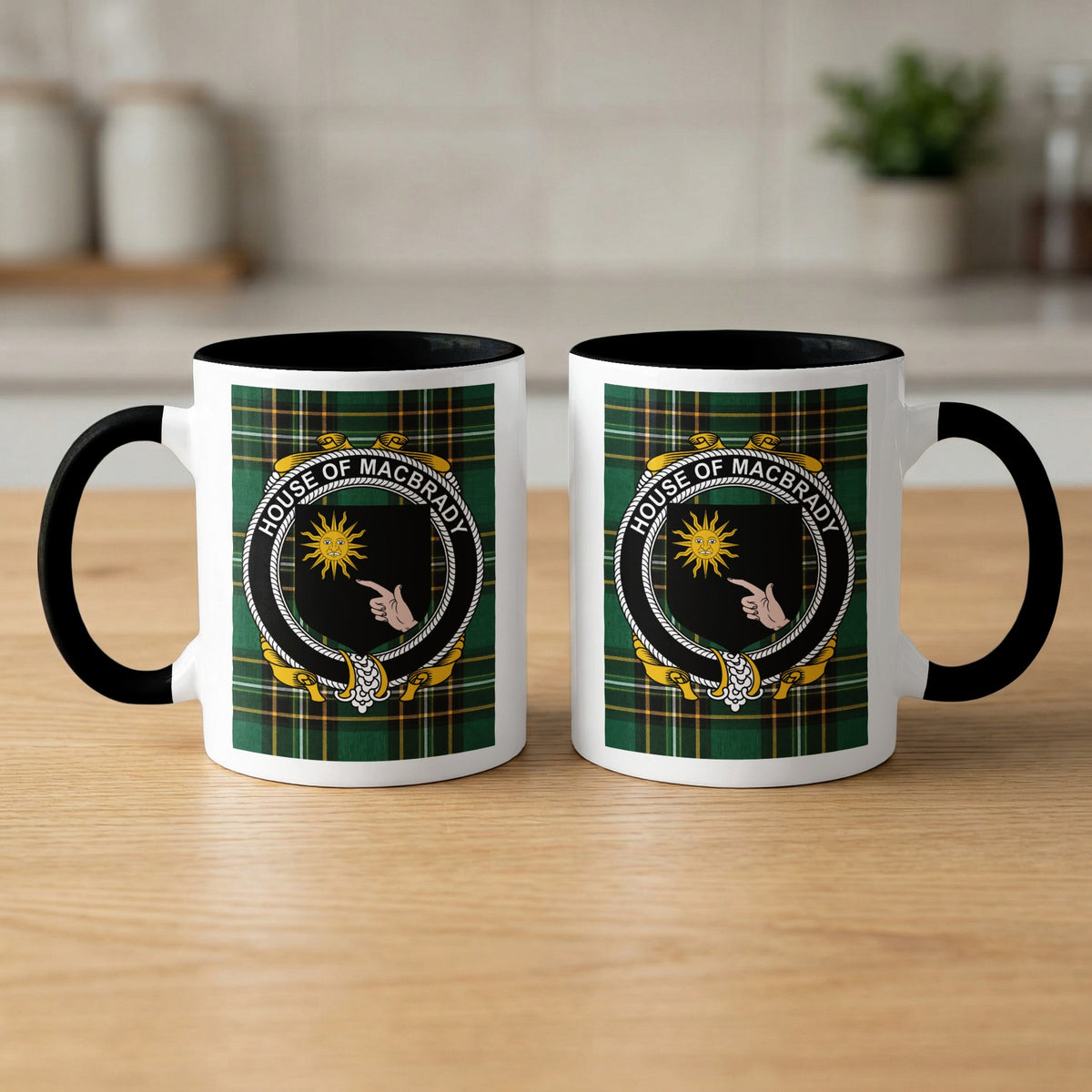 MacBrady family crest emblem mug with black handle and interior
