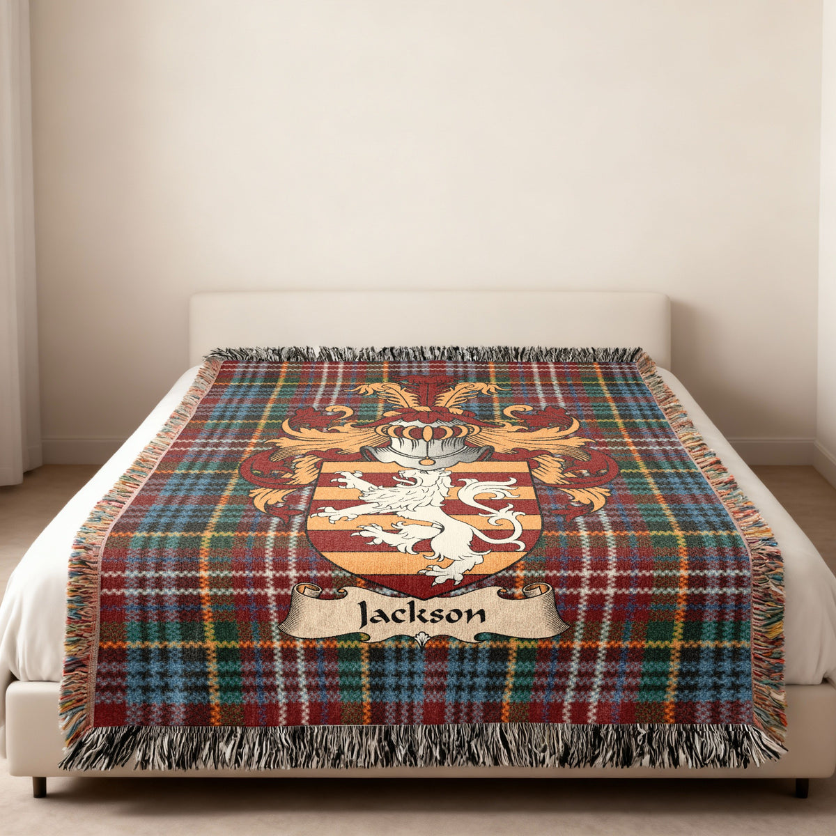 Jackson Scottish family shield woven blanket on a Caledonia tartan background