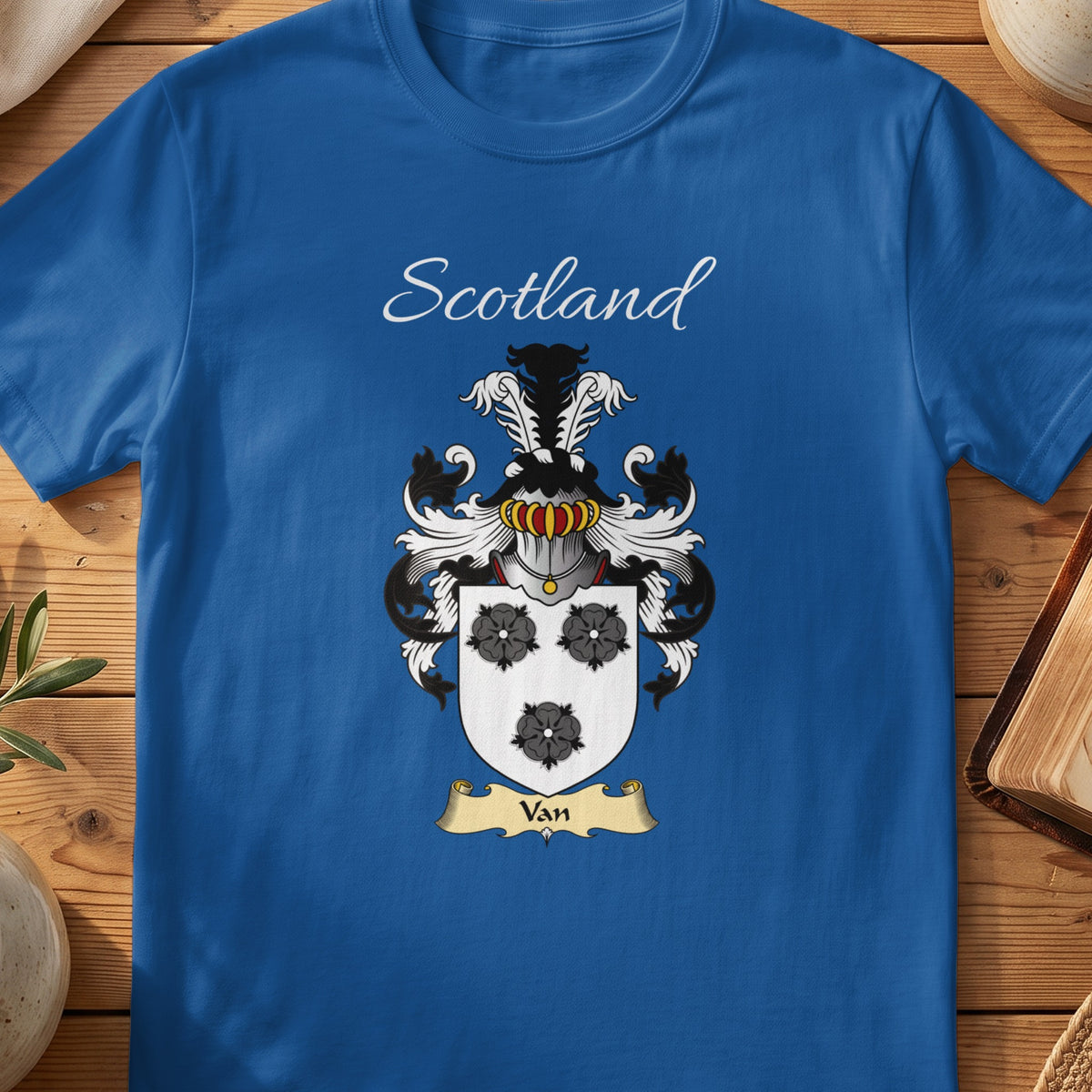 Royal blue Van unisex heritage T-shirt with the family shield and surname design.