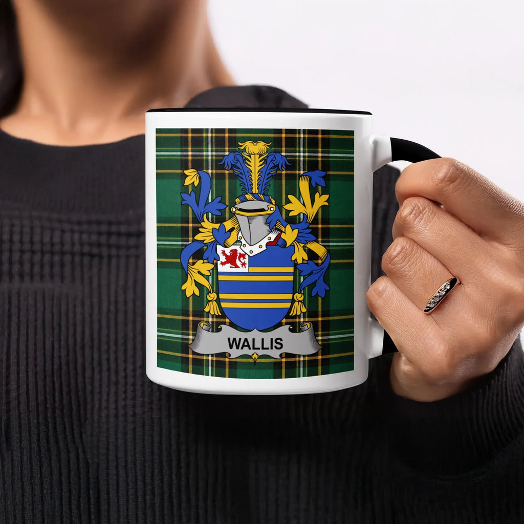 White mug with black handle featuring Wallis family crest on tartan background.