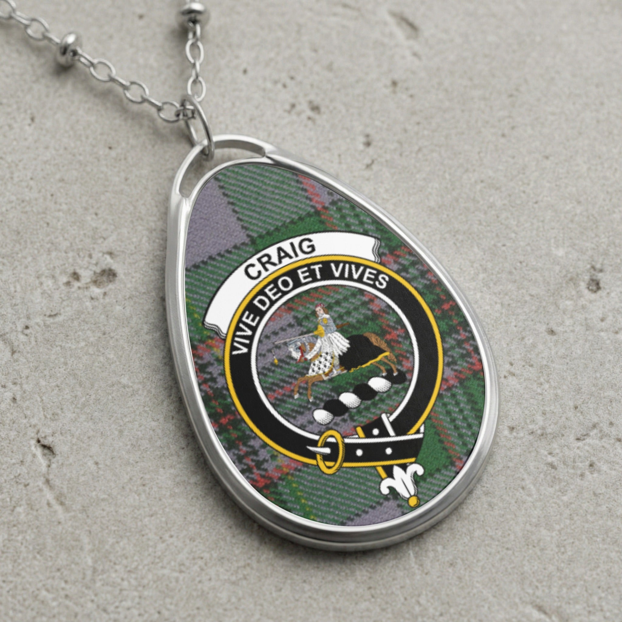 Craig clan Scottish tartan necklace with clan crest and Vive Deo Et Vives motto on tartan background